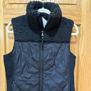 Prana Black full zip vest with fleece upper/ collar. Sz Medium, NWT.